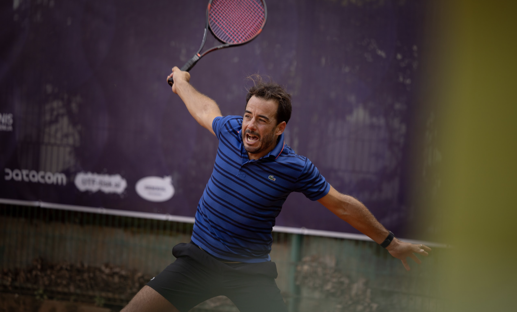 Fred Gil forehand on clay court